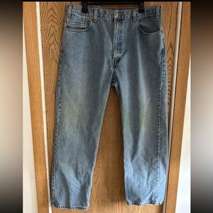 Levi straight leg jeans size 40 in a light blue wash.